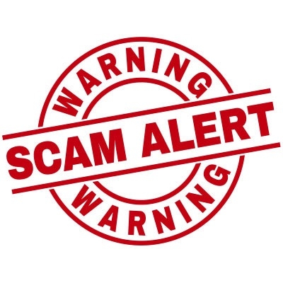 "Warning. Scam Alert. Warning," all in red letters.